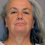 This booking photo provided Hampden County Sheriff's Department shows Rorie S. Woods, 55, of Hadley, Mass., Wednesday, Oct. 12, 2022, at Western Massachusetts Regional Women's Correctional Center, in Chicopee, Mass.
