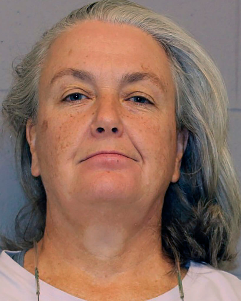 This booking photo provided Hampden County Sheriff's Department shows Rorie S. Woods, 55, of Hadley, Mass., Wednesday, Oct. 12, 2022, at Western Massachusetts Regional Women's Correctional Center, in Chicopee, Mass.