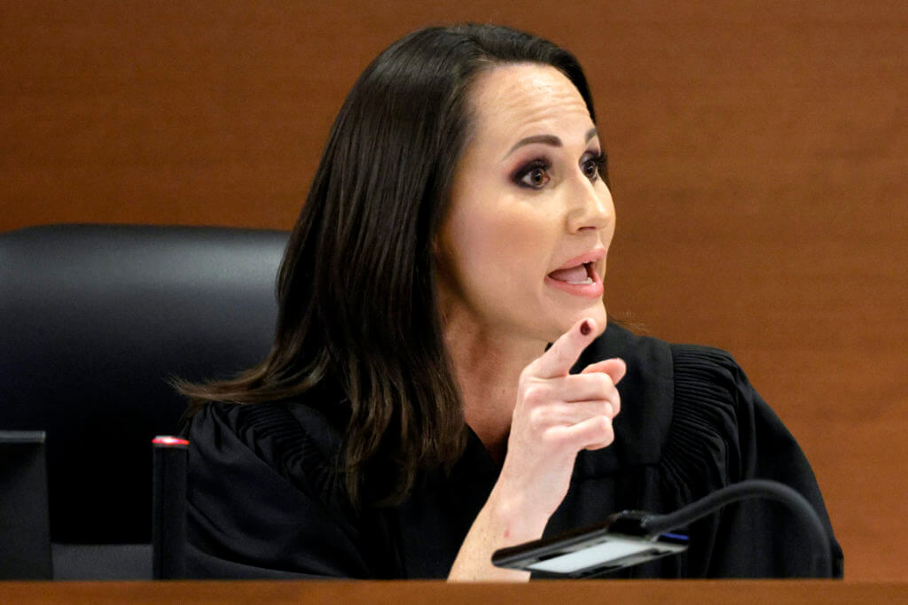 Judge Elizabeth Scherer orders Chief Assistant Public Defender David Wheeler to sit in the back of the courtroom during the sentencing hearing