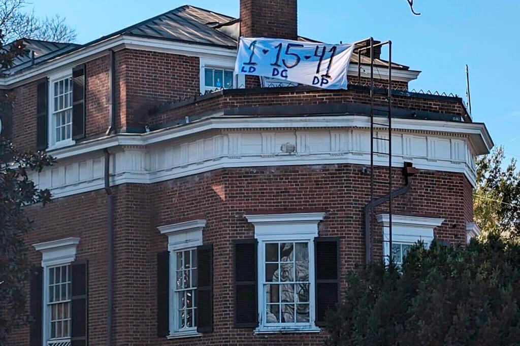 a banner outside of a house