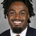 Smiling photo of man in a suit