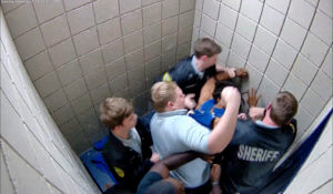 Georgia sheriff investigates jailers shown punching detainee