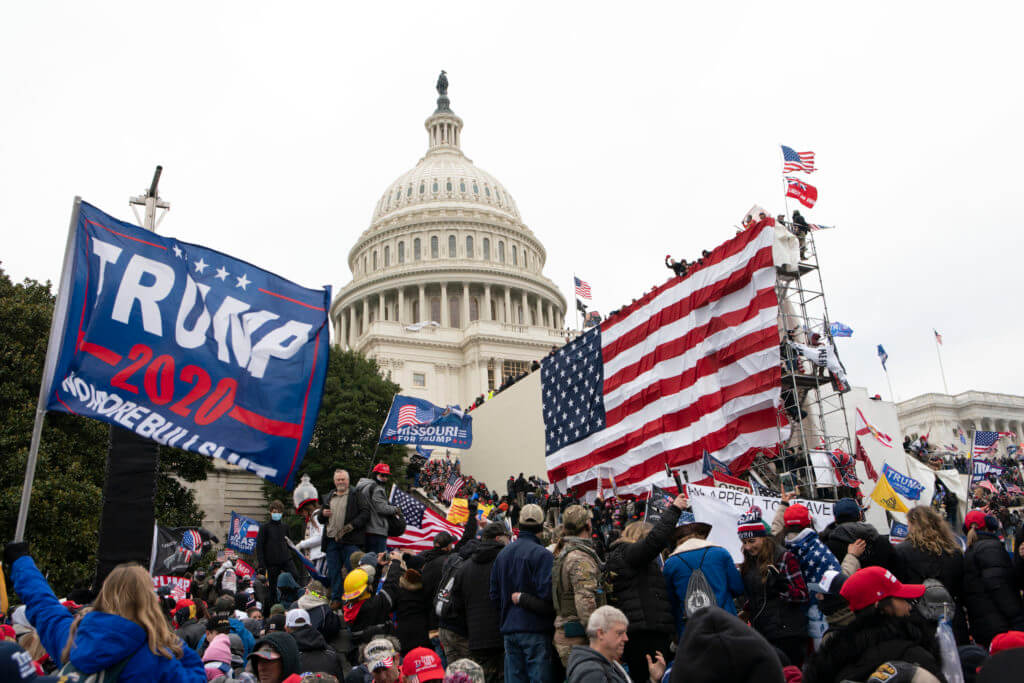 rioters storm the U.S. capitol on 1/6/21