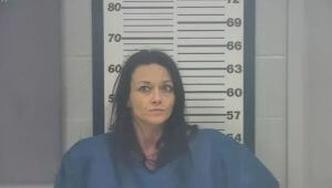 Woman charged in police shooting stole squad car while handcuffed