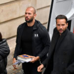 Andrew Tate and his brother Tristan are brought by police officers to the Court of Appeal, in Bucharest, Romania