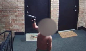 Man arrested after toddler seen wielding gun on camera