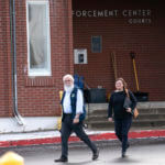 Latah County Prosecutor Bill Thompson, left, and Ashley Jennings, senior deputy prosecutor, leave the Latah County Courthouse, Wednesday, Jan. 4