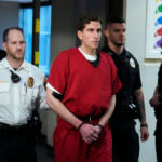 Bryan Kohberger is walked in shackles.