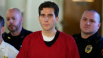 Bryan Kohberger, who is accused of killing four University of Idaho students, is escorted to an extradition hearing