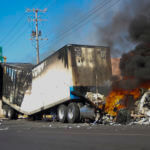 A truck burns on a street in Culiacan