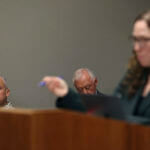 Innocence Project attorney Susan Freidman talks at the podium from the Albert "Ian" Schweitzer court case