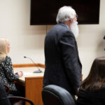 Latah County Prosecutor Bill Thompson, standing, addresses the court during a hearing for Bryan Kohberger