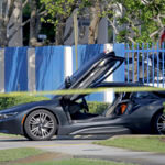 An empty vehicle appears on a street where rapper XXXTentacion was shot on Monday, June 18, 2018