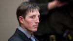 christopher schurr sits in court