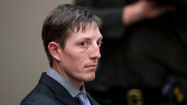 Michigan judge denies ex-officer’s bid to drop murder charge