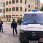 a police van believed to be carrying relatives of murdered model Abby Choi