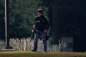 Maryland manhunt ends with arrest in woods, 2 officers shot