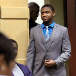 Trayvon Newsome enters the courtroom