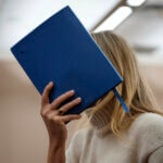 Actor Gwyneth Paltrow shields her face