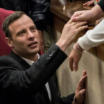 Oscar Pistorius leaves the High Court in Pretoria