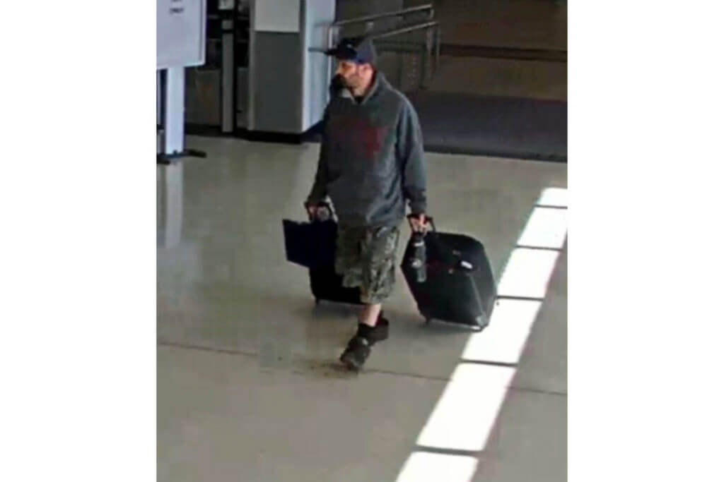 Airport surveillance camera shows alleged suspect Marc Muffley.
