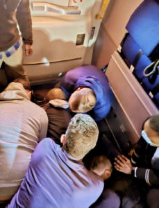 How passengers teamed up to restrain man on chaotic flight