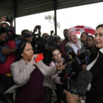 Tania Koen, a lawyer representing the parents of Reeva Steenkamp, speaks to the press