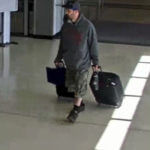 Airport surveillance camera shows alleged suspect Marc Muffley.