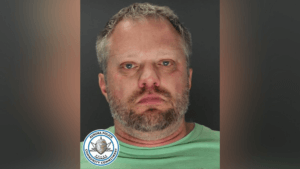 Dentist accused of murdering wife charged with trying to kill detective