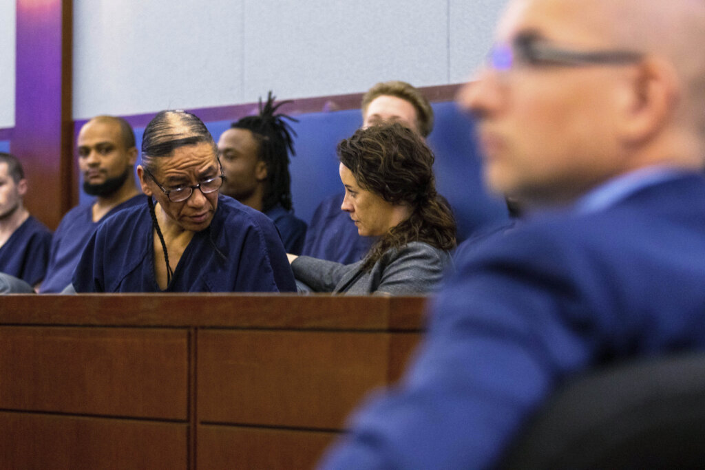 Nathan Chasing Horse speaks with his public defender on April 3, 2023.