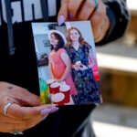 Ashleigh Webster shows a photo of Ivy Webster and Tiffany Guess