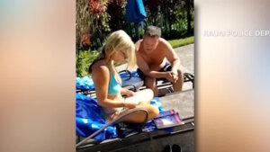 Video shows Doomsday Cult couple being served subpoena while sitting poolside