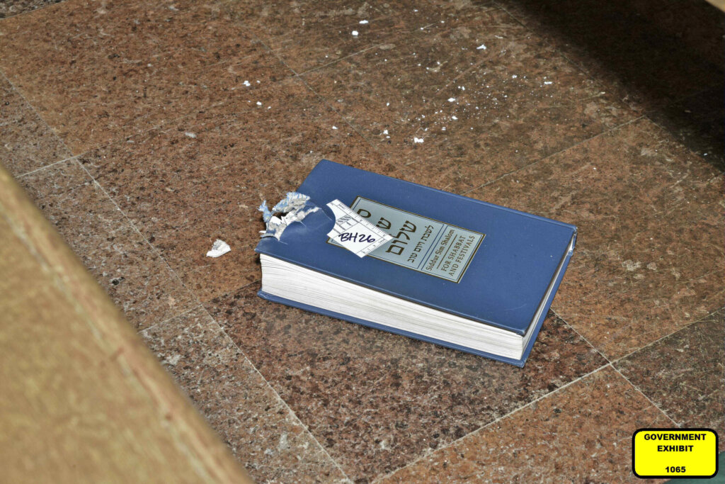 bullet-damaged prayer book