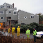 police search through the marsh in Oak Beach