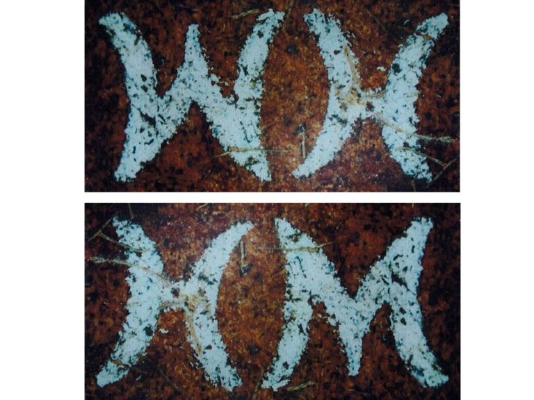 belt with the initials "WH or "HM."