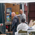 Authorities search the home of suspect Rex Heuermann.