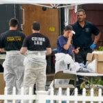 Authorities search the home of suspect Rex Heuermann.