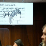 A page from Ethan Crumbley's journal is displayed in court.