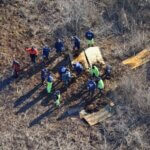 investigators search for Shannan Gilbert's body in a marsh area
