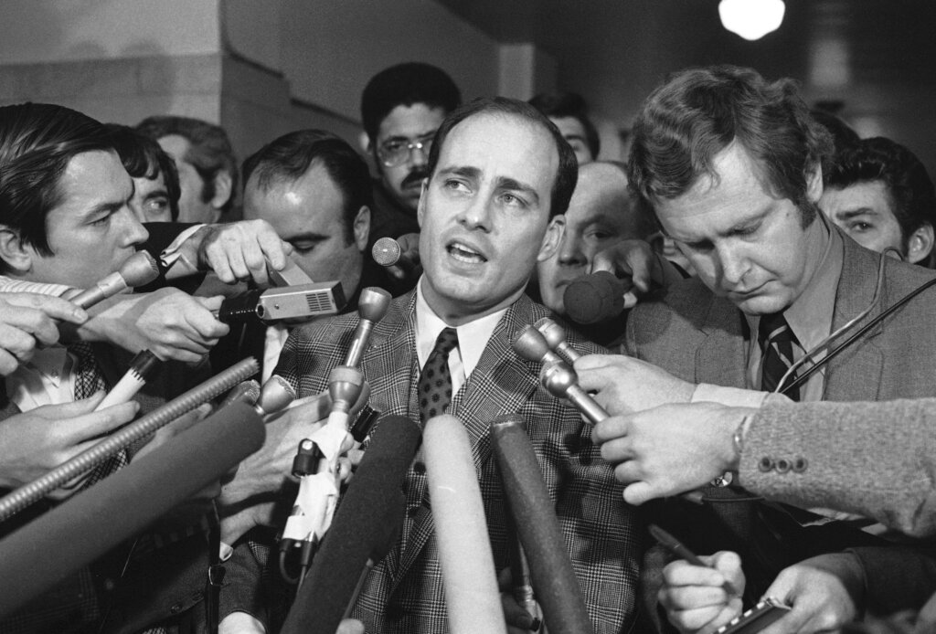 Charles Manson trial chief prosecutor Vincent Bugliosi talks with reporters