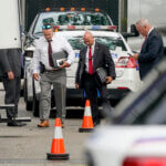 Authorities search the home of suspect Rex Heuermann.