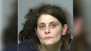 Two adults charged after children found naked with matted feces in hair