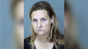 Rescue owner arrested after 55 dogs removed, puppies found in freezer
