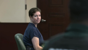 Sarah Boone, searching for 9th attorney, represents herself at hearing