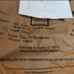 brown evidence bag with receipt