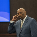 Rickey Jones points to his head