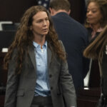 Kaitlin Armstrong leaves the courtroom after receiving a sentence of 90 years for the murder of Anna Moriah Wilson at the Blackwell-Thurman Criminal Justice Center on Friday, Nov. 17, 2023. Armstrong was found guilty of killing Anna Moriah Wilson in May 2022 and sentenced to 90 years in prison.