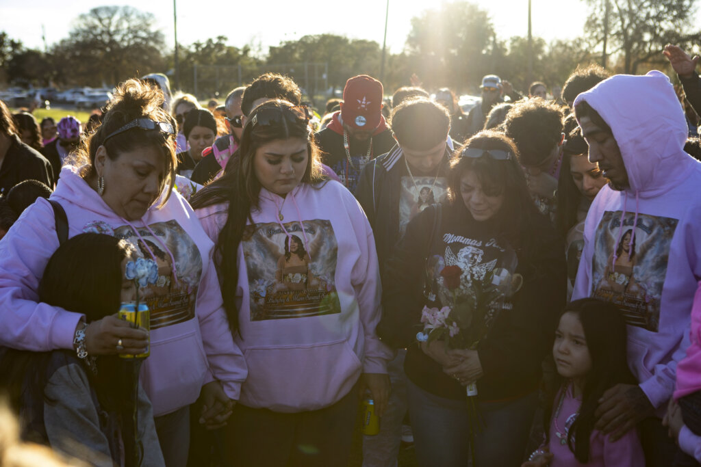 group of people at a vigil