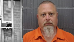 Richard Allen meets attorneys in metal cage, fighting to oust judge