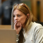 Michelle Troconis sits in court